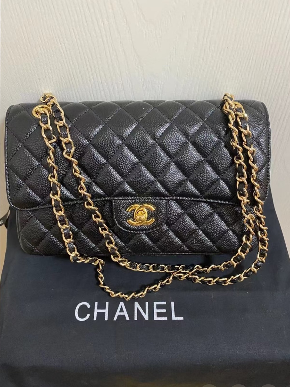 CHANEL Black Quilted Shoulder Bag with Gold Chain